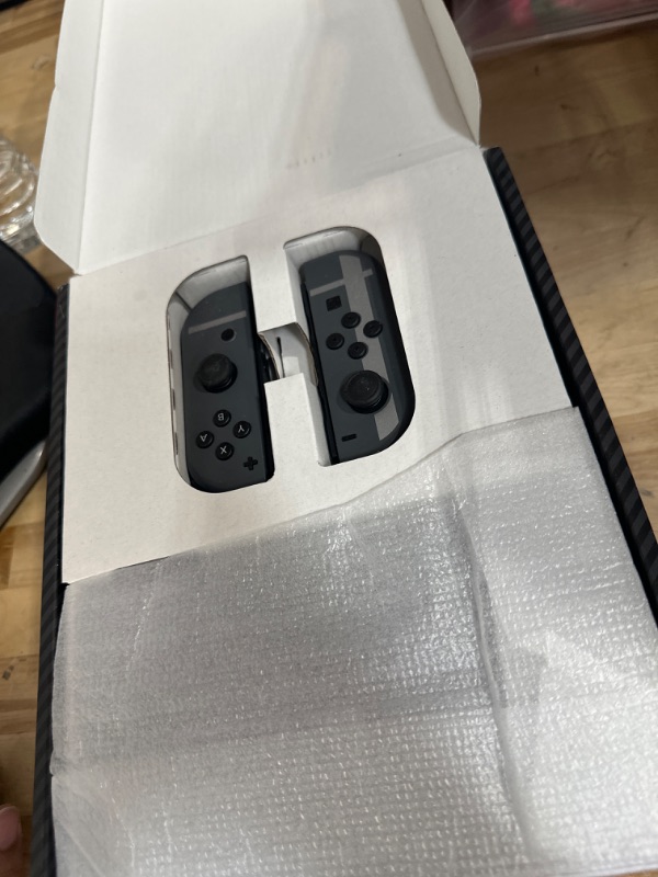 Photo 2 of Nintendo Switch™ - OLED Model: Super Smash Bros.™ Ultimate Bundle (Full Game Download + 3 Mo. Nintendo Switch Online Membership Included) Nintendo Switch - OLED Model: Super Smash Bros. Ultimate Bundle (Full Game Download + 3 Mo Switch Online Membership I