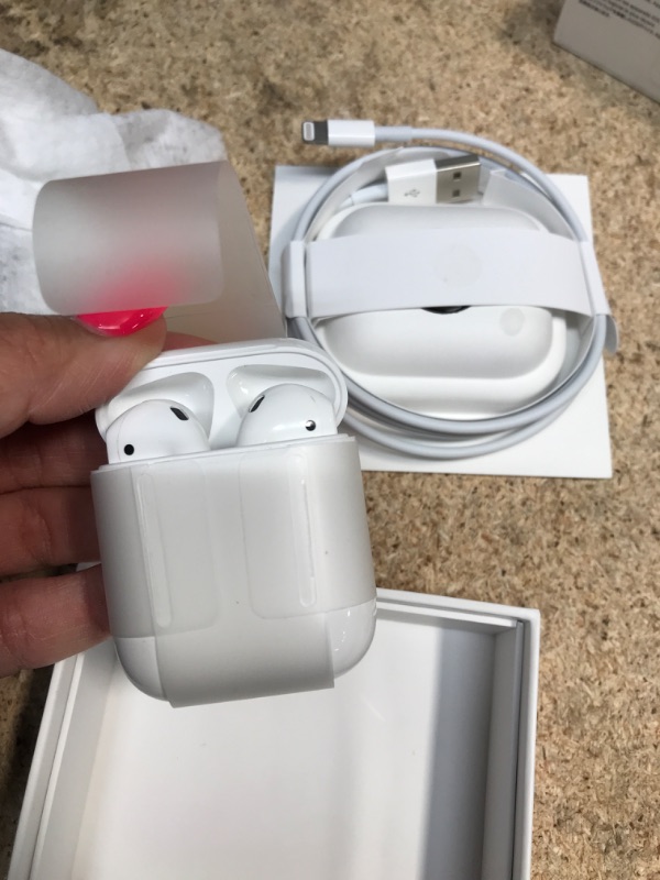 Photo 2 of Apple AirPods (2nd Generation) Wireless Ear Buds, Bluetooth Headphones with Lightning Charging Case Included