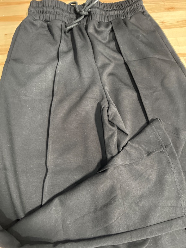 Photo 1 of Black long oversized joggers size medium 