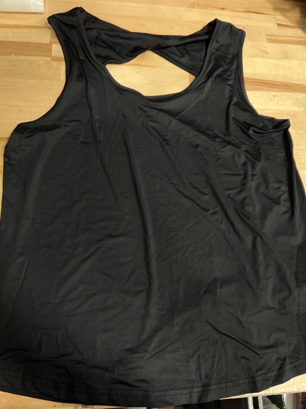 Photo 1 of Black spandex cross back workout top size large 