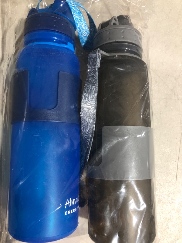 Photo 2 of 2 Pack Travel Water Bottles TSA Approved Reusable Collapse Traveling Collapsible Silicone Foldable BPA-Free, Steady 22 oz, Portable, Hiking, Durable, Leak Proof Twist Cap (Gray+Blue) 2 Pack (Gray+Blue)