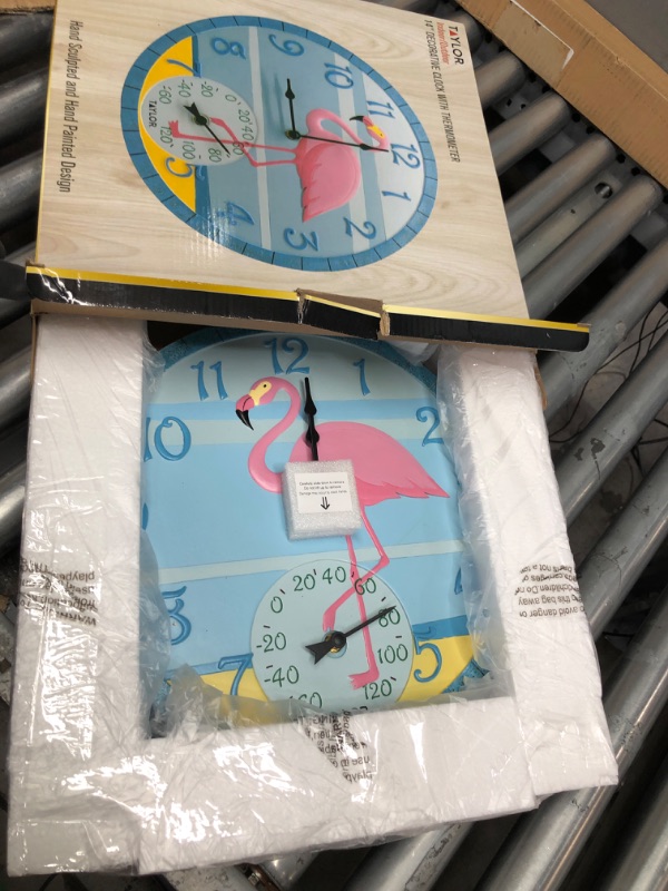 Photo 2 of **PARTS ONLY NON REFUNDABLE**READ NOTES**
Taylor Precision Products, Flamingo Poly Resin Indoor and Outdoor Clock and Thermometer, 14 Inch, Multi-Color