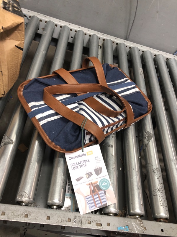 Photo 2 of CleverMade Collapsible LUXE Tote, Navy Striped - 30L (8 Gal) Structured Tote Bag with Handles and Reinforced Bottom - Reusable Grocery Bag, Shopping Bag, Utility Tote Bag
