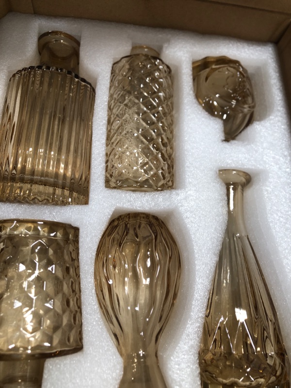 Photo 1 of Amber Glass  Vases Set of 12, TBWIND Small Vases for Flowers, Champagne Mini Vintage Vases for Centerpieces, Bud Vase in Bulk for Wedding Decor, Single Flowers, Office and Home Table Flower Décor