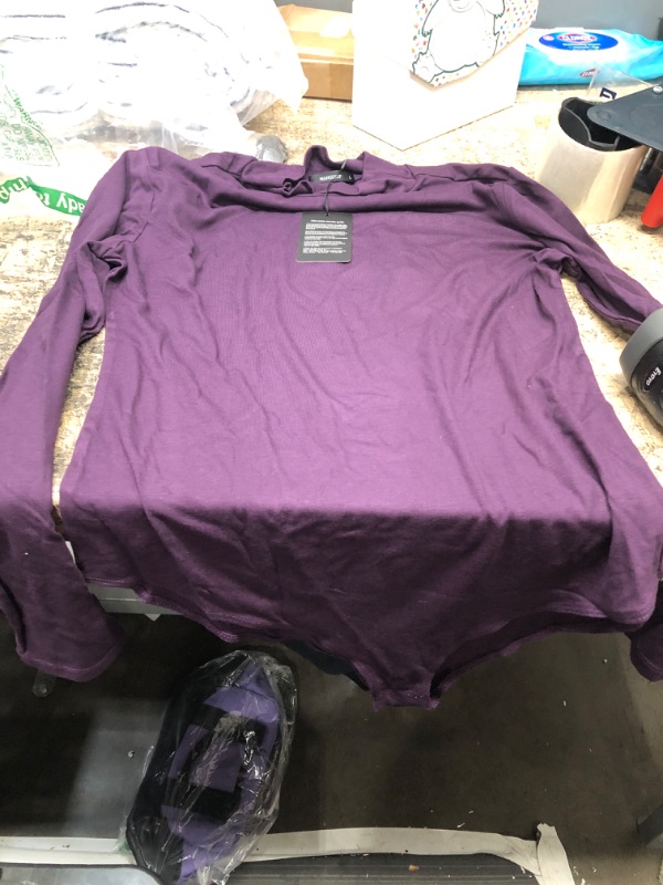 Photo 1 of dark purple bondt suit long sleeve large