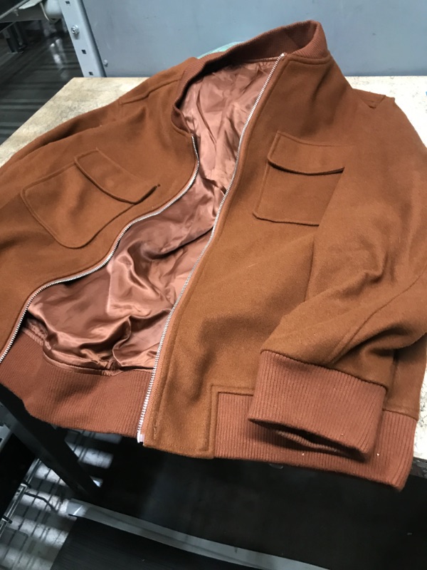 Photo 1 of brown jacket medium