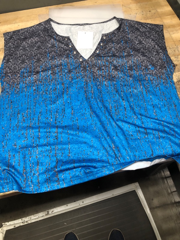 Photo 1 of 2XL black and blue shirt 
