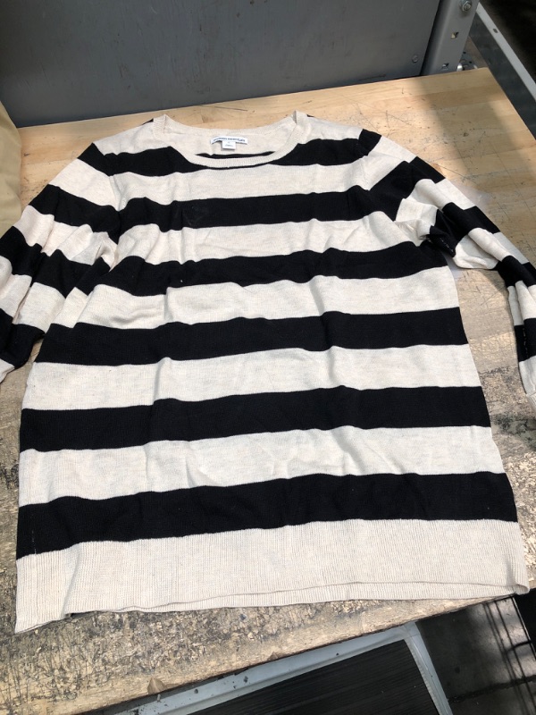 Photo 1 of cream and black striped sweater XL