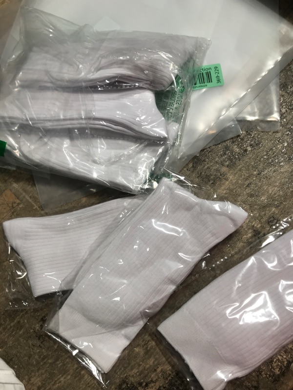 Photo 1 of 6 pairs of white womens high socks 