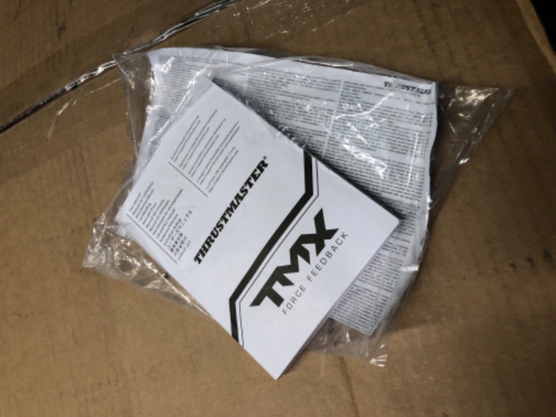 Photo 1 of ***USED AND DIRTY - DOESN'T POWER ON WHEN PLUGGED IN - UNABLE TO TROUBLESHOOT***
Thrustmaster TMX Force Feedback Racing Wheel (Xbox Series X/S,One,PC) Black Thrustmaster TMX Force Feedback Racing Wheel wheel