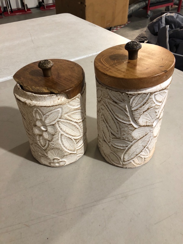 Photo 3 of (READ FULL POST) Deco 79 Ceramic Handmade Intricately Carved Decorative Jars with Wood Lids, Set of 2 9", 10"H, White