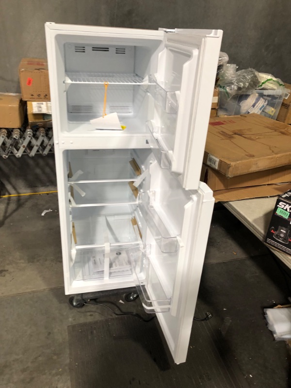 Photo 8 of ***MAJOR DAMAGE - SEE COMMENTS***
18 cu. ft. Top Freezer Refrigerator DOE in White