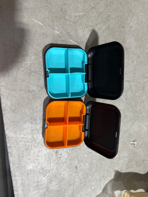 Photo 2 of Pill Box Portable Pill Dispensing Box, Travel Portable Pill Box, 4-Compartment Daily Portable Pill Organizer, Suitable for Vitamins, Medicines, Fish Oil (Black+Cyan) 2 pack