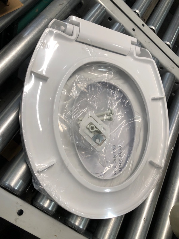 Photo 2 of ***USED - LIKELY MISSING PARTS - UNABLE TO VERIFY FUNCTIONALITY***
Toilet Seat, Round Toilet Seat with Toddler Seat Built in, Potty Training Toilet Seat Round Fits Both Adult and Child Round