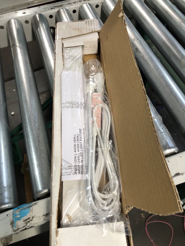 Photo 2 of UltraPro 18in. Linkable LED Light Fixture, Selectable Brightness, Slim LED Strip Light used item * settings will not change 
