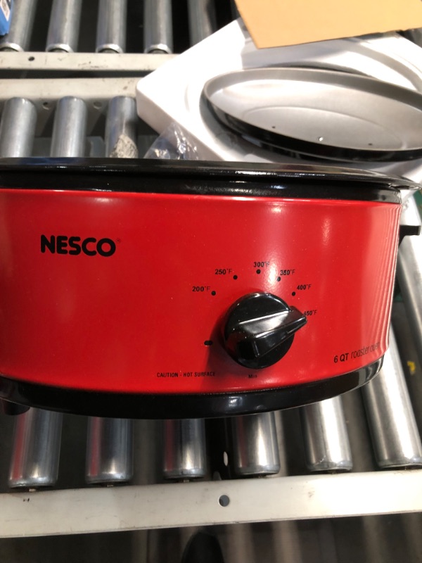 Photo 2 of ***VERY USED*MINOR DAMAGE FROM USE*METAL INSERT NEEDS TO BE SCRUBBED***
NESCO 4816-12, Roaster Oven with Porcelain Cookwell, Red, 6 quart, 750 watts 6 Quart Porcelain Cookwell Red