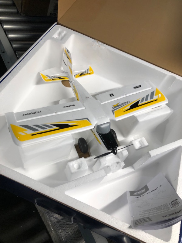 Photo 1 of **NON FUNCTIONAL**PARTS ONLY**
E-flite RC Airplane UMX Turbo Timber Evolution BNF Basic Transmitter, Yellow