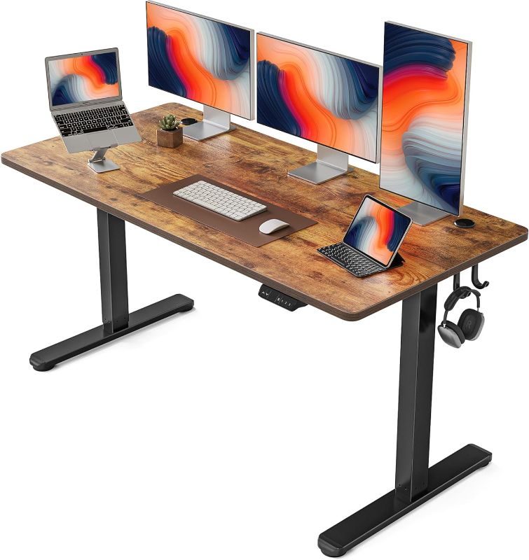 Photo 1 of FEZIBO Height Adjustable Electric Standing Desk, 63 x 24 Inches Stand up Table, Sit Stand Home Office Desk with Splice Board, LightRusticbrown 63LShape Light Rusticbrown