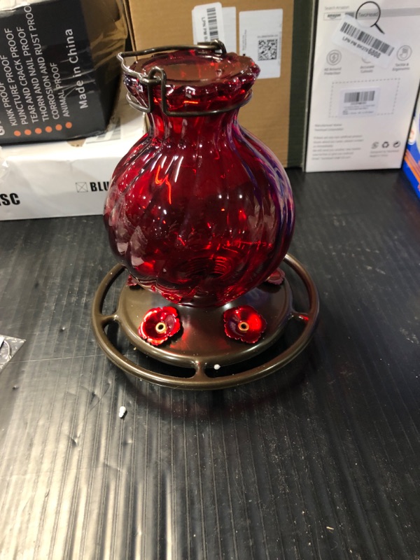 Photo 2 of (MISSING PARTS)
Hummingbird Feeder, Auslar 26 Ounces Glass Hummingbird Feeders for Outdoors Hanging Ant and Bee Proof, Ant Moat & 5 Flower Feeding Ports, Rustproof, Leakproof, Netted Flower Bud Shape Bottle, Red