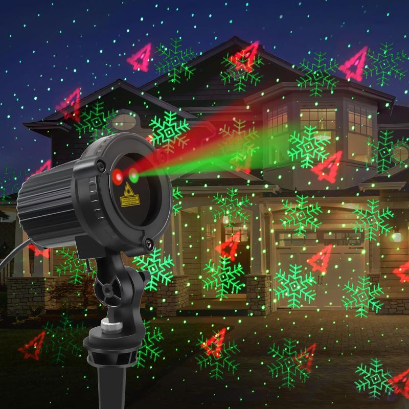 Photo 1 of Christmas Laser Lights,with 30 Christmas Patterns Outdoor Garden Laser Lights for Garden, Yard, House, Tree Holiday Decoration Lights