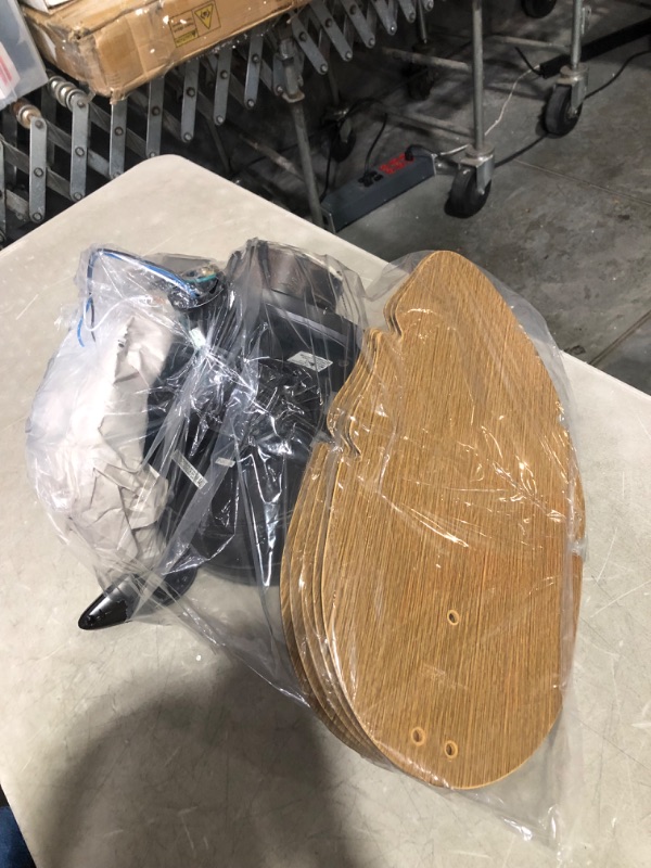 Photo 3 of ***USED - NO PACKAGING - LIKELY MISSING PARTS - UNABLE TO VERIFY FUNCTIONALITY***
Honeywell Ceiling Fans Royal Palm, 52 Inch Tropical LED Ceiling Fan with Light, Pull Chain, Three Mounting Options, Hand Carved Solid Wood Blades - 50204-01 (Bronze)
