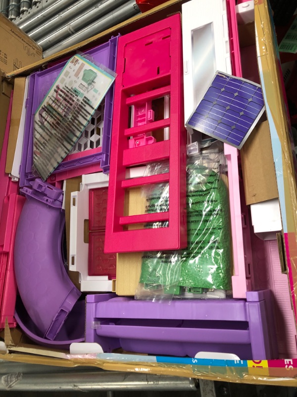 Photo 1 of Barbie DreamHouse Dollhouse with 70+ Accessories, Working Elevator & Slide, Transforming Furniture, Lights & Sounds Wheelchair Accessible Elevator