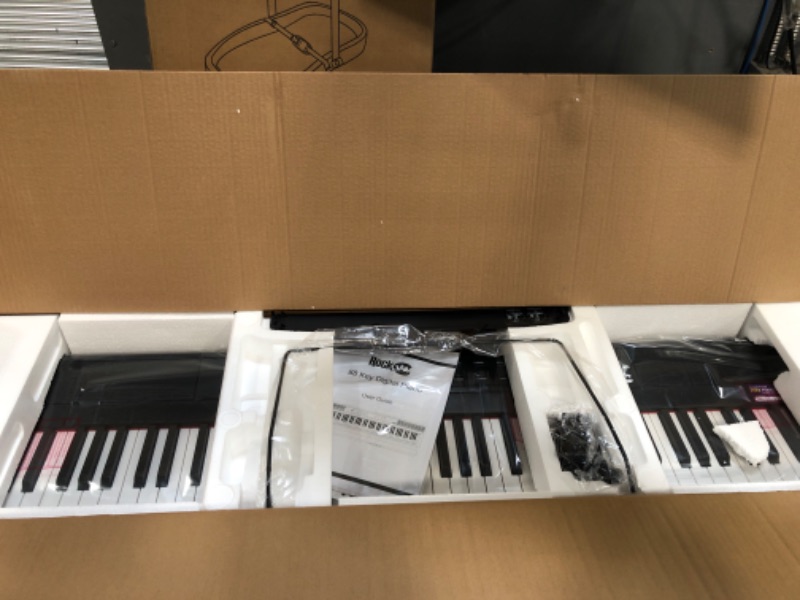 Photo 2 of RockJam 88 Key Digital Piano with Full Size Semi-Weighted Keys, Power Supply, Sheet Music Stand, Piano Note Stickers & Simply Piano Lessons 88-Key Digital Piano Button Edition