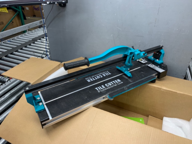 Photo 2 of VEVOR Manual Tile Cutter, 24 inch, Porcelain Ceramic Tile Cutter with Tungsten Carbide Cutting Wheel, Infrared Positioning, Anti-Skid Feet, Durable Rails for professional installers or beginners