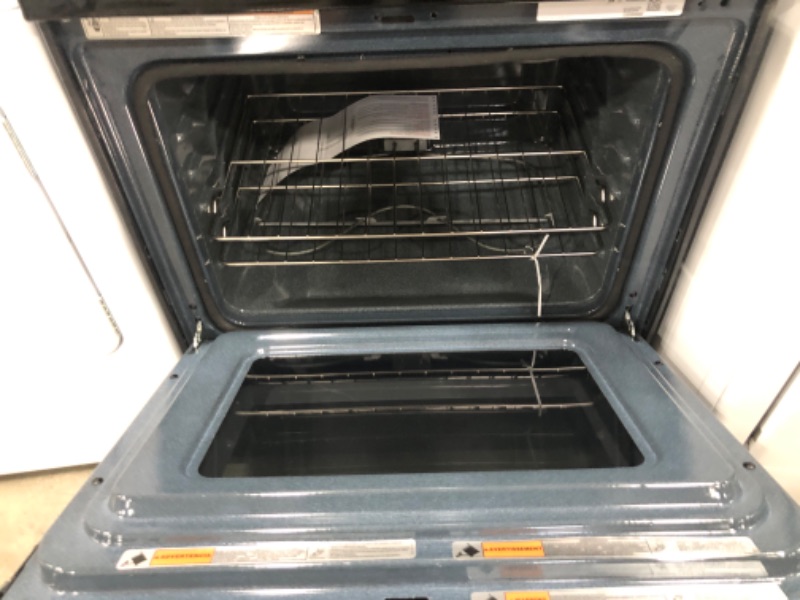 Photo 5 of 5.3 cu. ft. Electric Range with Steam Clean and 5 Elements in Black
