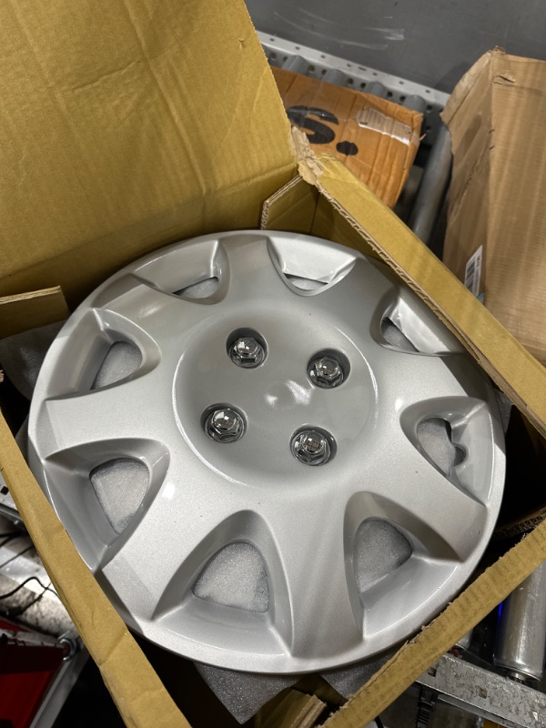 Photo 1 of KT Four ABS Plastic Silver Colored Hubcaps - 14 Inch Diameter