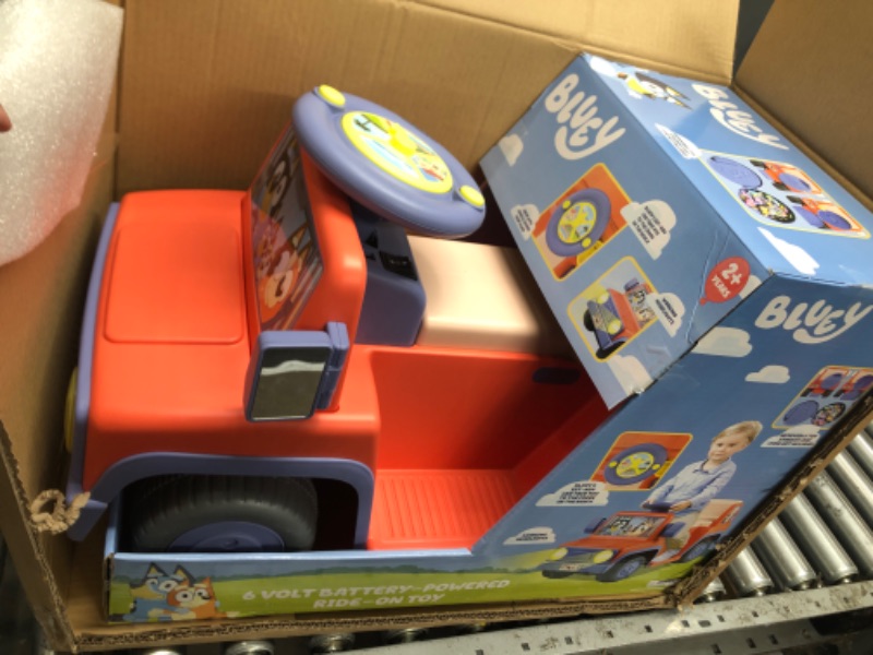 Photo 2 of Bluey 6V Ride On Car for Toddlers - Interactive Electric Car for Kids with Sound Effects & Music, Riding Toy for Boys & Girls, Includes 6V Rechargeable Battery & Charger