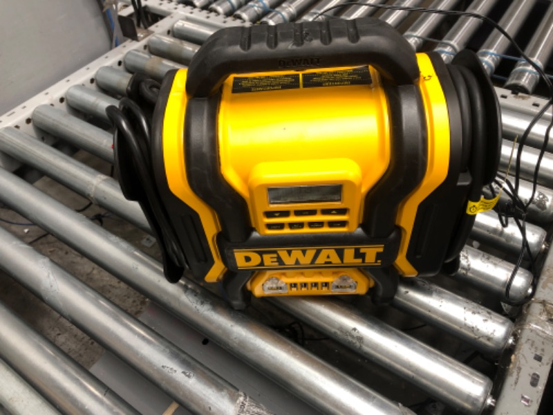 Photo 1 of DEWALT DXAEPS14 1600 Peak Battery Amp 12V Automotive Jump Starter/Power Station with 500 Watt AC Power Inverter, 120 PSI Digital Compressor, and USB Power , Yellow