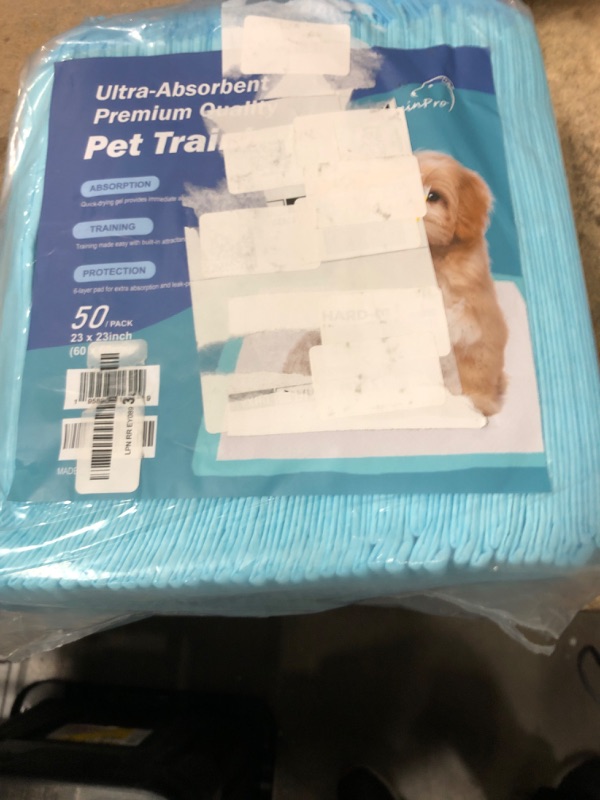 Photo 1 of 50 count ulta absorbent puppy pads 
