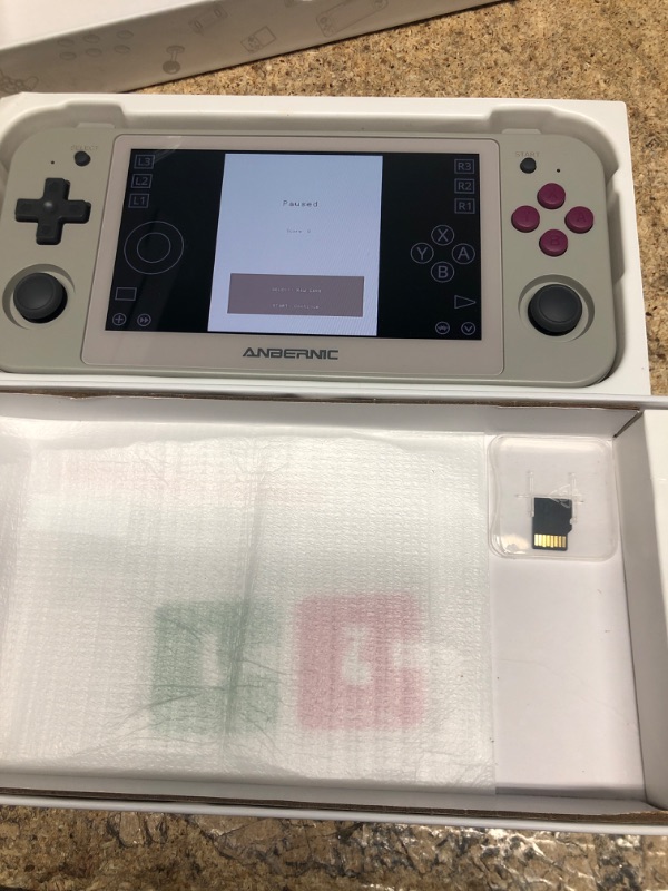 Photo 1 of RG505 Retro Handheld Game Console 4.95 inch OLED Touch Screen Android 12 Unisoc Tiger T618 64-bit Video Player Built-in Hall Joyctick Support OTA Update 128G Card 4000+ Games (DXR-RG505-Grey)