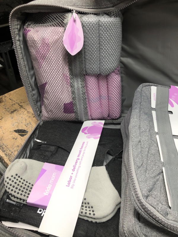Photo 1 of Frida Mom Motherload[ed] Hospital Bag - Pre-Packed Essentials for Labor and Delivery, Postpartum Recovery and Baby (30 Piece Gift Set)