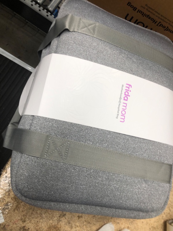 Photo 1 of Frida Mom Motherload[ed] Hospital Bag - Pre-Packed Essentials for Labor and Delivery, Postpartum Recovery and Baby (30 Piece Gift Set)