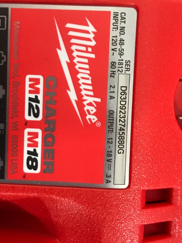 Photo 1 of MISSING THE DRILL AND BATTERY ***Milwaukee M18 18V Lithium-Ion Brushless Cordless 1/2 in. Compact Drill/Driver with One 2.0 Ah Battery, Charger and Tool Bag
