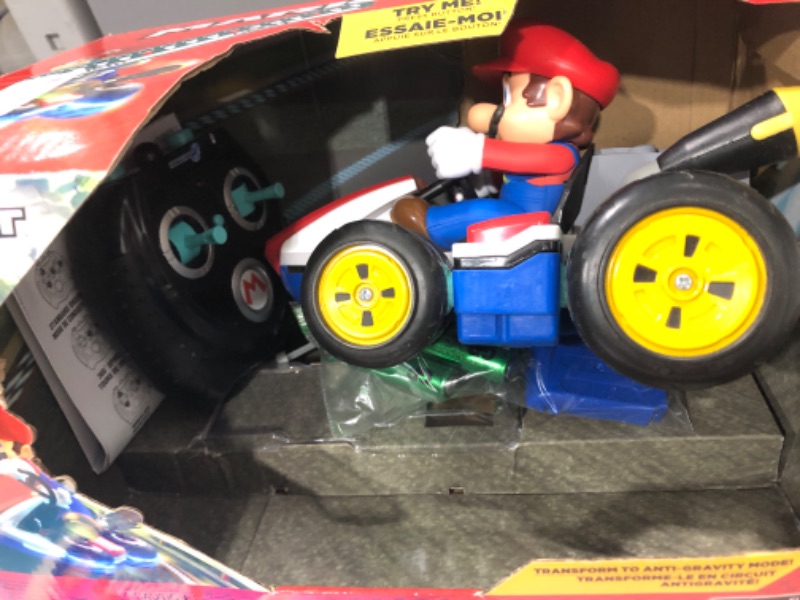 Photo 2 of **SEE NOTES/BATTERY COVER BROKEN OFF**
Mario Kart Mini Anti-Gravity R/C Racer