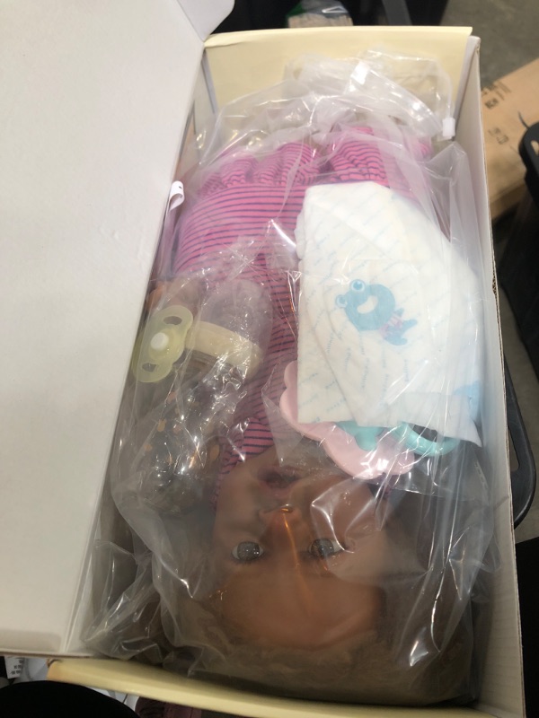 Photo 1 of JIZHI Reborn Baby Dolls Black - 22 Inch Lifelike Soft Body Realistic-Newborn Baby Dolls Taupe Eyes Caramel Skin Tone Pink Striped Skirt Real Life Baby Dolls and Toy Accessories Gift for Kids Age 3 Saskia