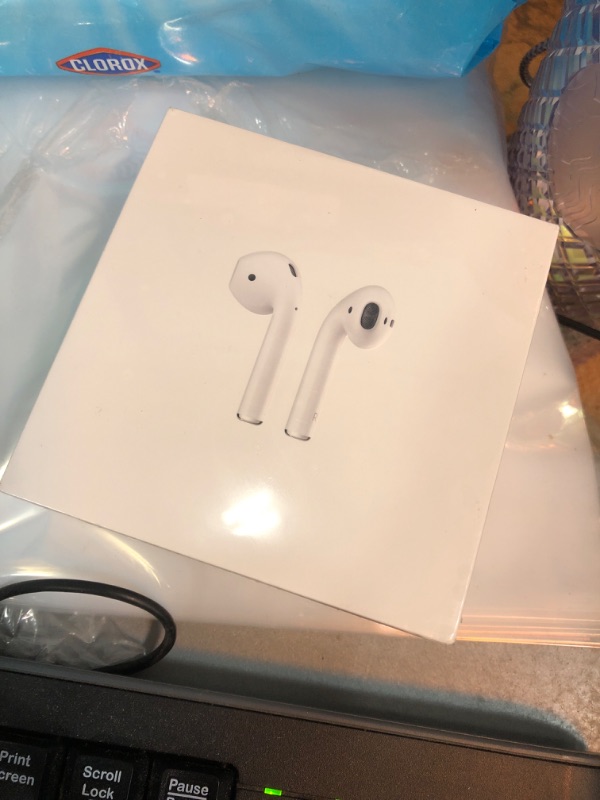 Photo 4 of **BRAND NEW FACTORY SEALED** AirPods with Charging Case