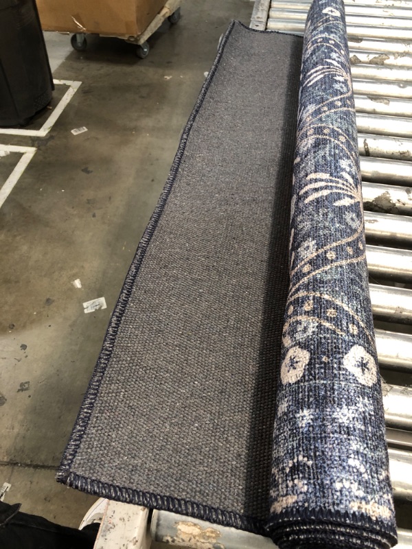 Photo 1 of 4' X 6' BLUE RUG 