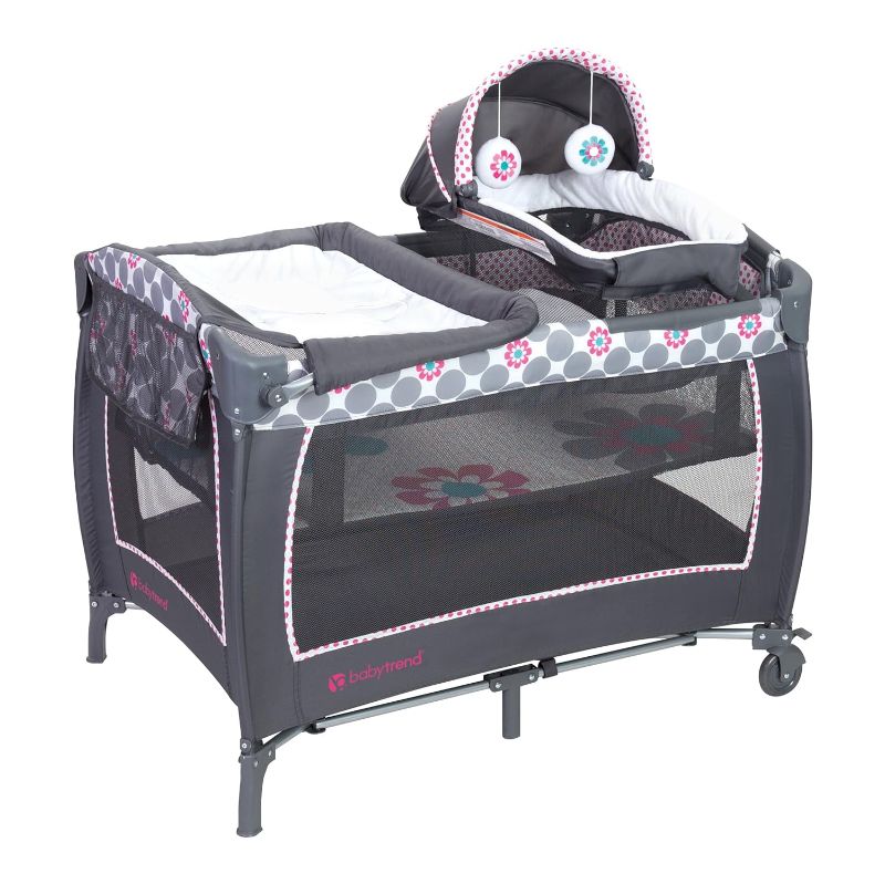 Photo 1 of Baby Trend Lil' Snooze Deluxe II Nursery Center, Daisy Dots

