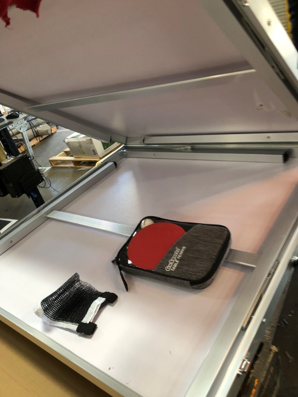 Photo 1 of DENTED FRAME; DAMAGED LOCK GoSports Mid-Size Table Tennis Game Set - Indoor/Outdoor Portable Table Tennis Game with Net, 2 Table Tennis Paddles and 4 Balls Blue Table