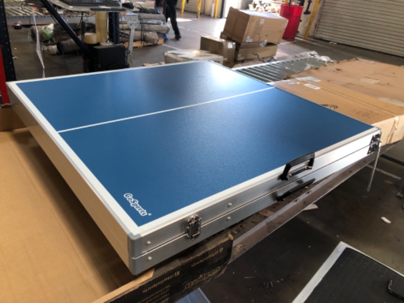 Photo 3 of DENTED FRAME; DAMAGED LOCK GoSports Mid-Size Table Tennis Game Set - Indoor/Outdoor Portable Table Tennis Game with Net, 2 Table Tennis Paddles and 4 Balls Blue Table