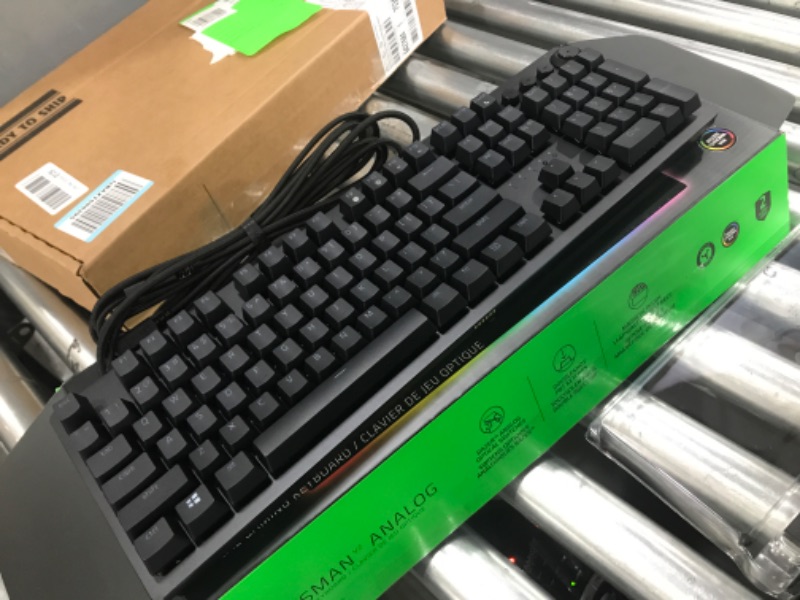 Photo 2 of Razer Huntsman V2 Analog Gaming Keyboard: Adjustable Actuation via Analog Optical Switches - Rapid Trigger Mode - Chroma RGB Lighting - Magnetic Wrist Rest - Dedicated Media Keys & Dial - Black
