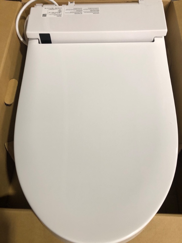 Photo 2 of * previously opened * see images for damage *
TOTO SW3084#01 WASHLET C5 Electronic Bidet Toilet Seat with PREMIST and EWATER+ 