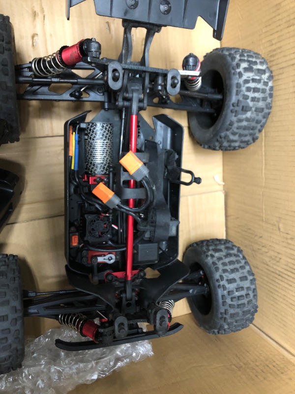 Photo 4 of ARRMA 1/8 Notorious 6S V5 4WD BLX Stunt RC Truck with Spektrum Firma RTR (Transmitter and Receiver Included, Batteries and Charger Required), Black, ARA8611V5T1