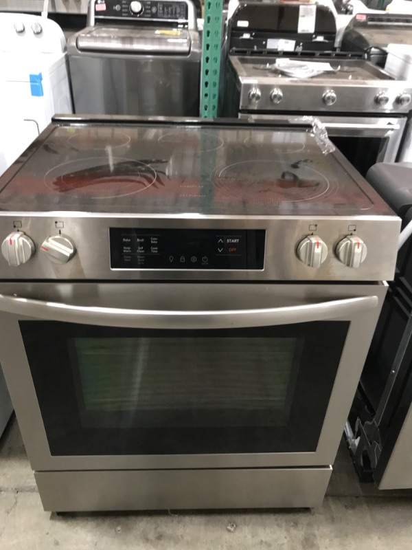 Photo 5 of Frigidaire 30-in Glass Top 5 Burners 5.3-cu ft Self-Cleaning Slide-in Electric Range (Fingerprint Resistant Stainless Steel)
