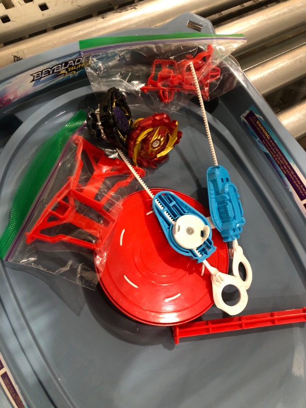 Photo 3 of BEYBLADE Burst Surge Speedstorm Motor Strike Battle Set -- Battle Game playset with Motorized Stadium, 2 Battling Top Toys and 2 Launchers