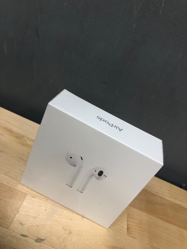 Photo 2 of *BRAND NEW , FACTORY SEALED**
AirPods with Charging Case